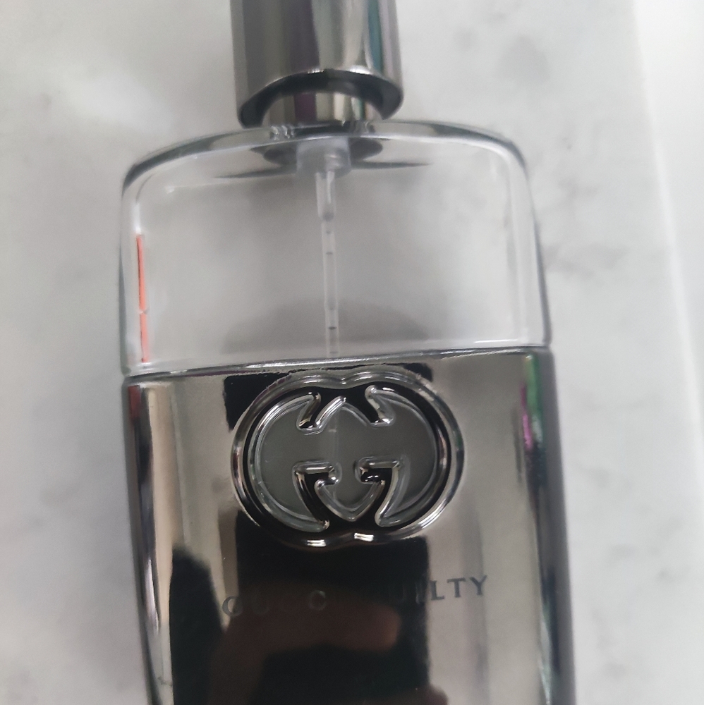 Empty Gucci Guilty Bottle
